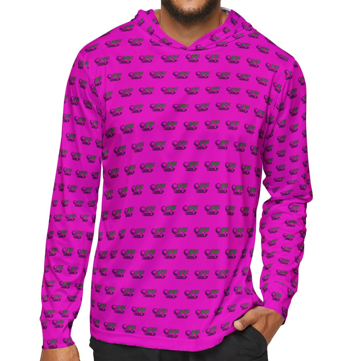 A man wearing a bright magenta long-sleeve hoodie with a repeating black whale pattern, paired with black shorts, against a plain white background.