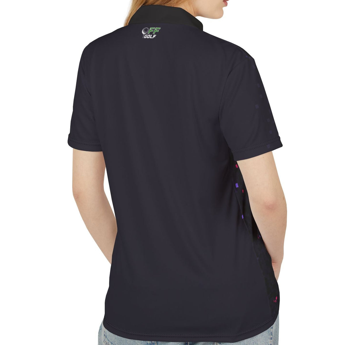 Person wearing a black polo shirt with purple patterns on a white background