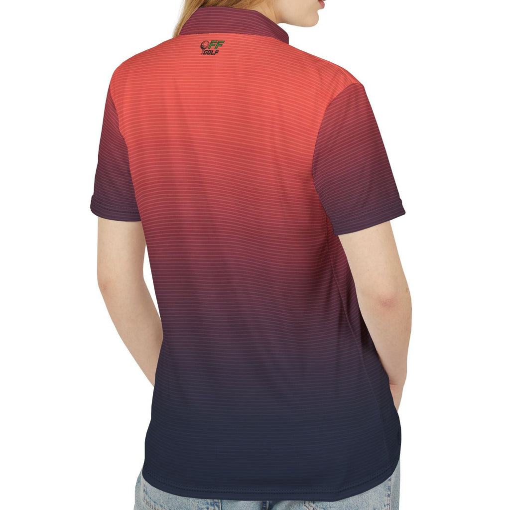 A woman shown from the back wearing a short-sleeve polo shirt with a horizontal striped texture and a vertical gradient transitioning from red-orange at the shoulders to dark navy at the hem. The shirt features a small embroidered logo on the upper back.