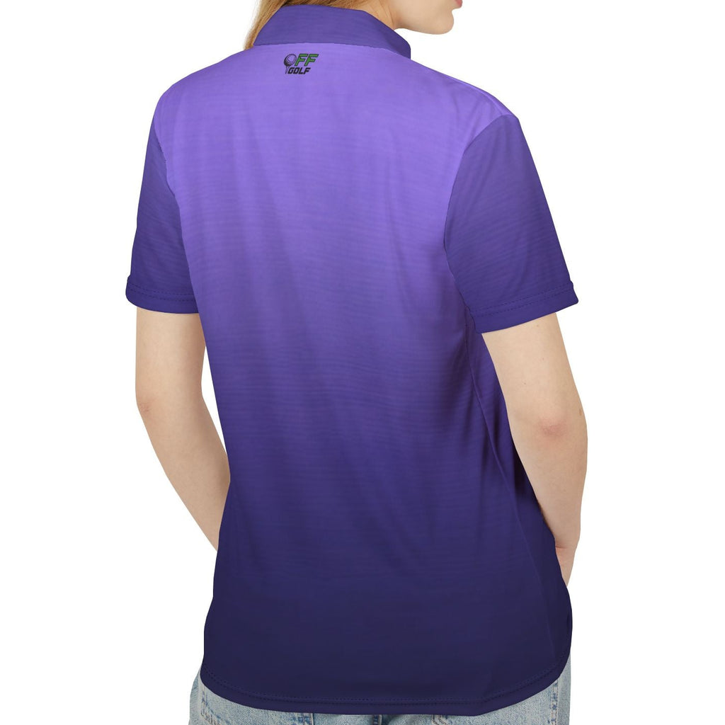 A woman shown from the back wearing a short-sleeve polo shirt with a purple-to-blue gradient, paired with light-wash jeans, against a plain white background.