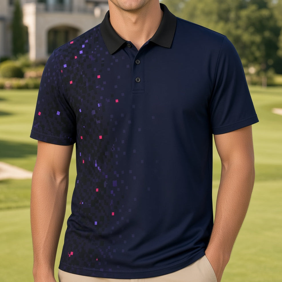 A man wearing a navy blue short-sleeve polo shirt with a black collar and a subtle multicolor geometric pattern on the front, standing on a golf course with a house in the background.