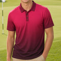 A smiling young man stands on a golf course wearing a short-sleeve polo shirt with a dark red collar and a gradient body that fades into deep burgundy at the hem, paired with khaki pants.
