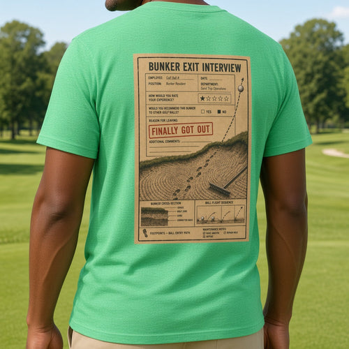 A man on a golf course wearing a bright green t-shirt from the back, which features a large vintage-style newspaper graphic with the headline 'BUNKER EXIT INTERVIEW'.