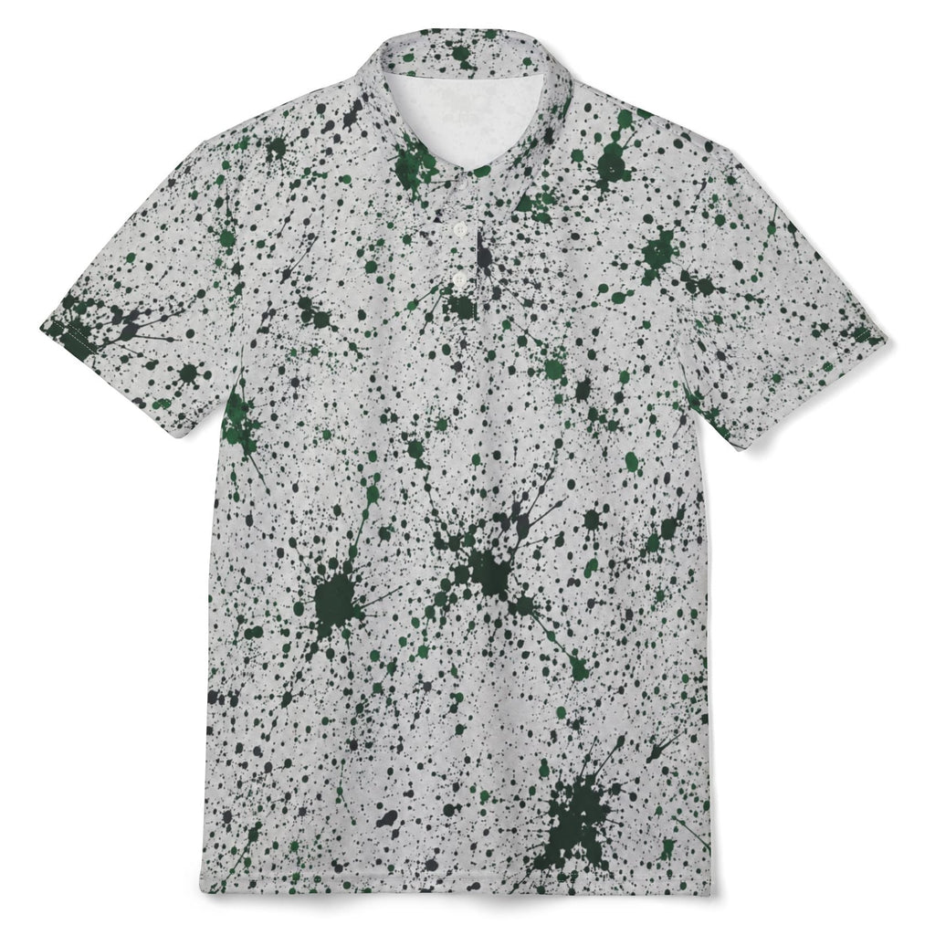 A short-sleeve polo shirt with a white base covered in dark green and black paint splatter patterns, displayed flat against a solid white background.